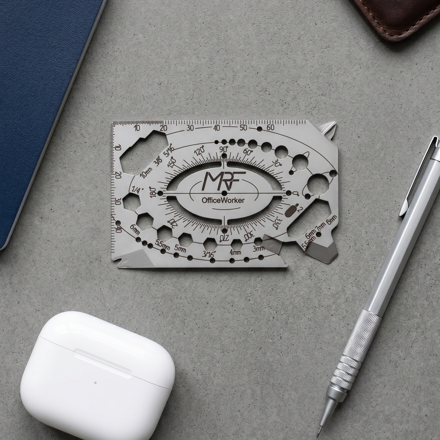 OfficeWorker bladeless multitool in titanium — flight-safe EDC — Designed in Ukraine