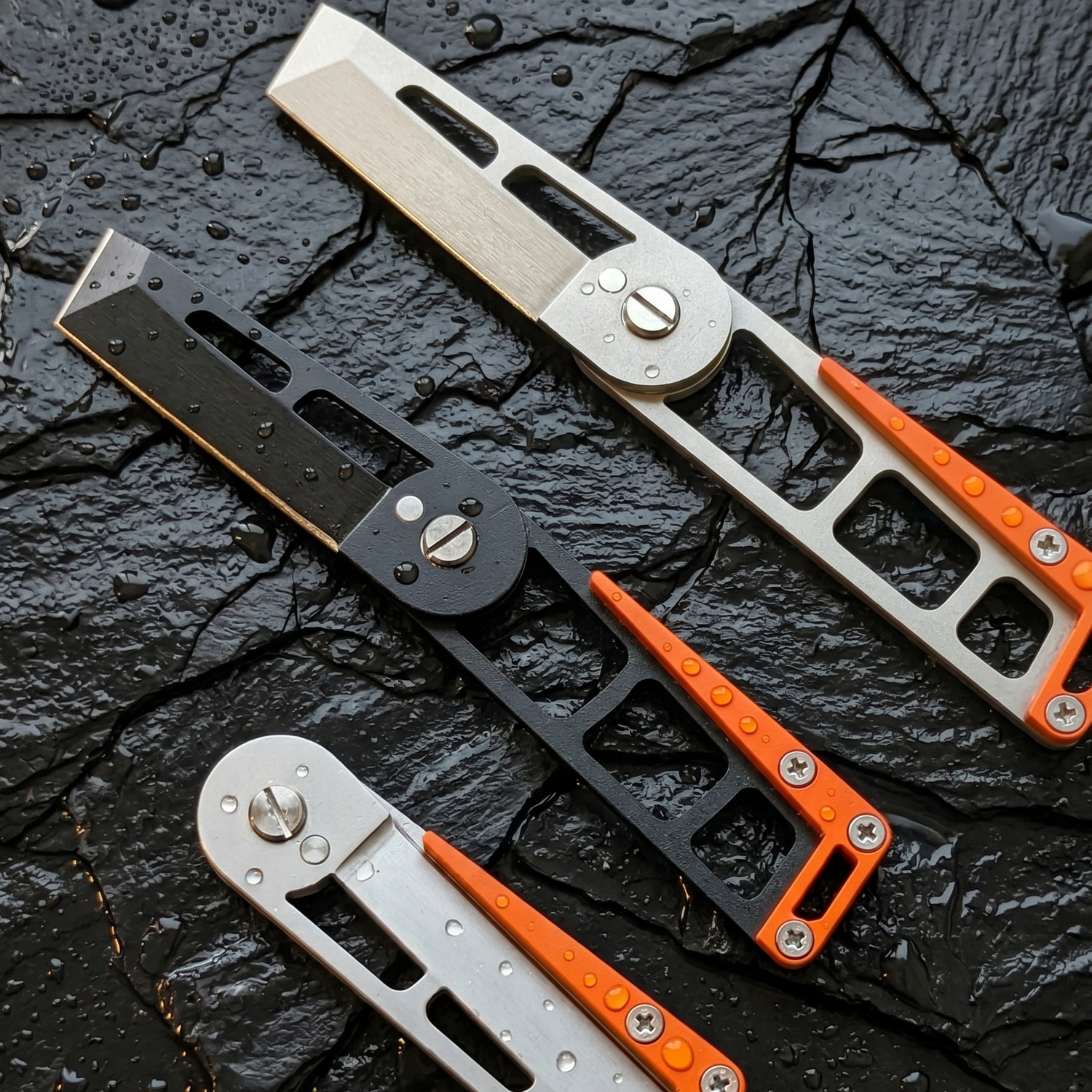MRF Fold knife open position showing 440C blade and titanium handle — Designed in Ukraine