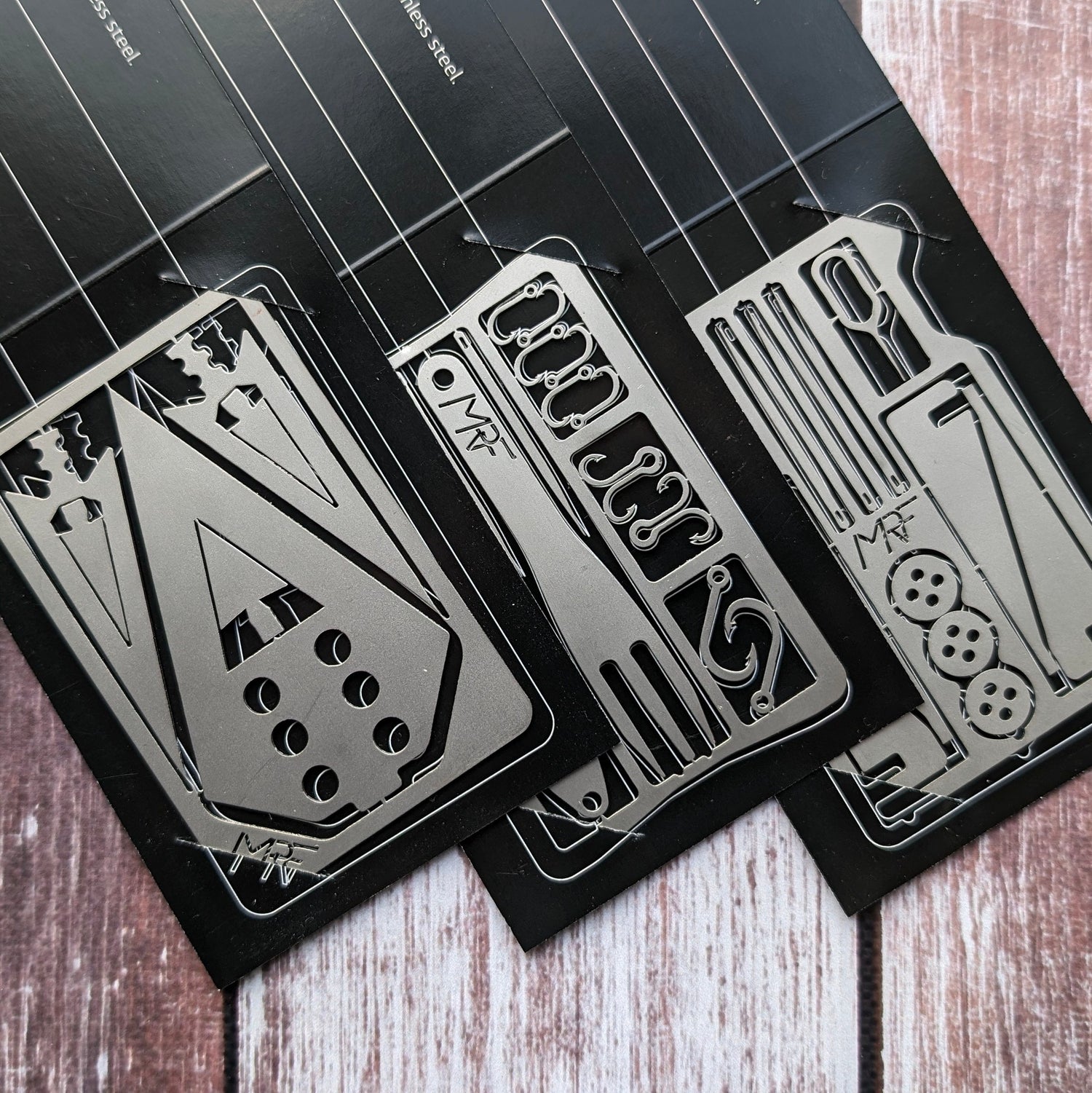 Survival Wallet Kit — 31 tools across 3 credit cards: Fisherman, Urban, Hunter — Designed in Ukraine