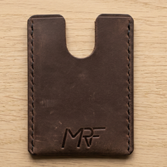MRF leather sleeve protecting a titanium card multitool — Designed in Ukraine by MRF Tools