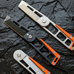 MRF Fold knife open position showing 440C blade and titanium handle — Designed in Ukraine