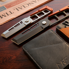 MRF Fold pocket knife in hand with leather case — EDC — Designed in Ukraine