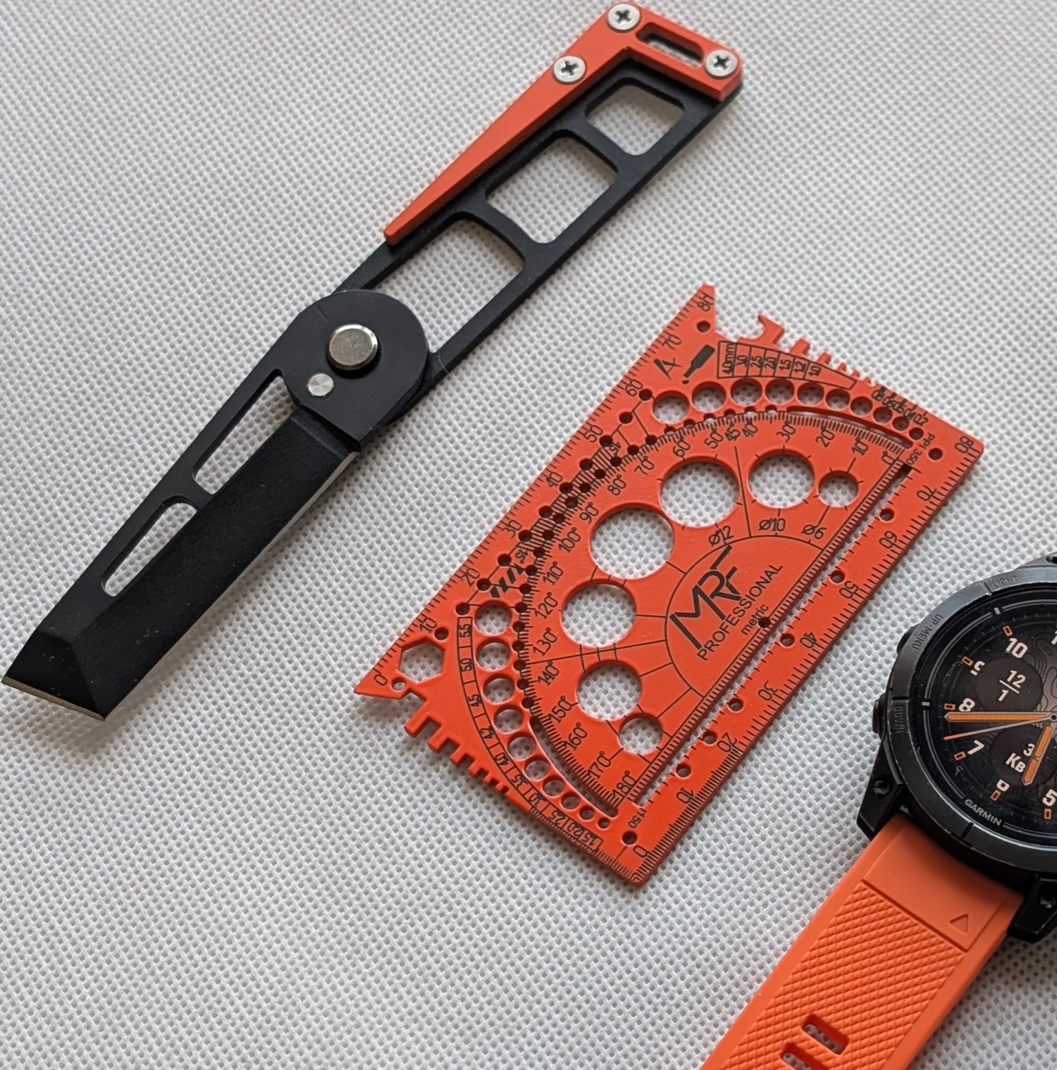 MRF Fold with leather case and orange Cerakote accent — Designed in Ukraine