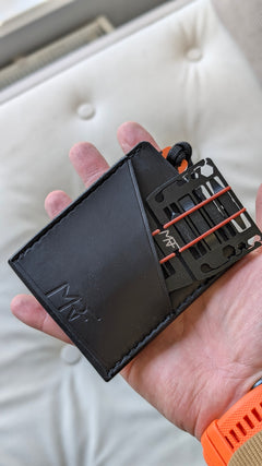MRF Wallet in hand showing real-world EDC carry — leather cardholder — Designed in Ukraine