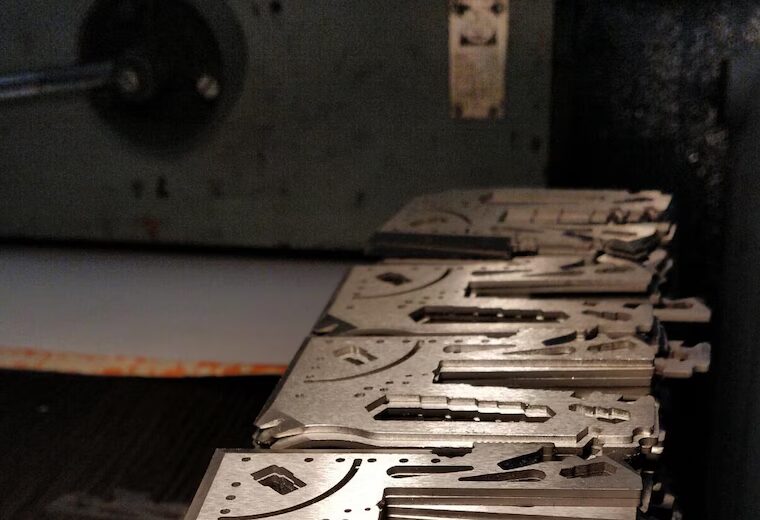 Cards fresh off the machine, milled edges visible