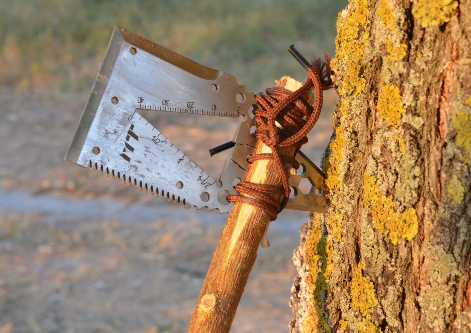 Gen1 MT card lashed to a wooden handle as an axe