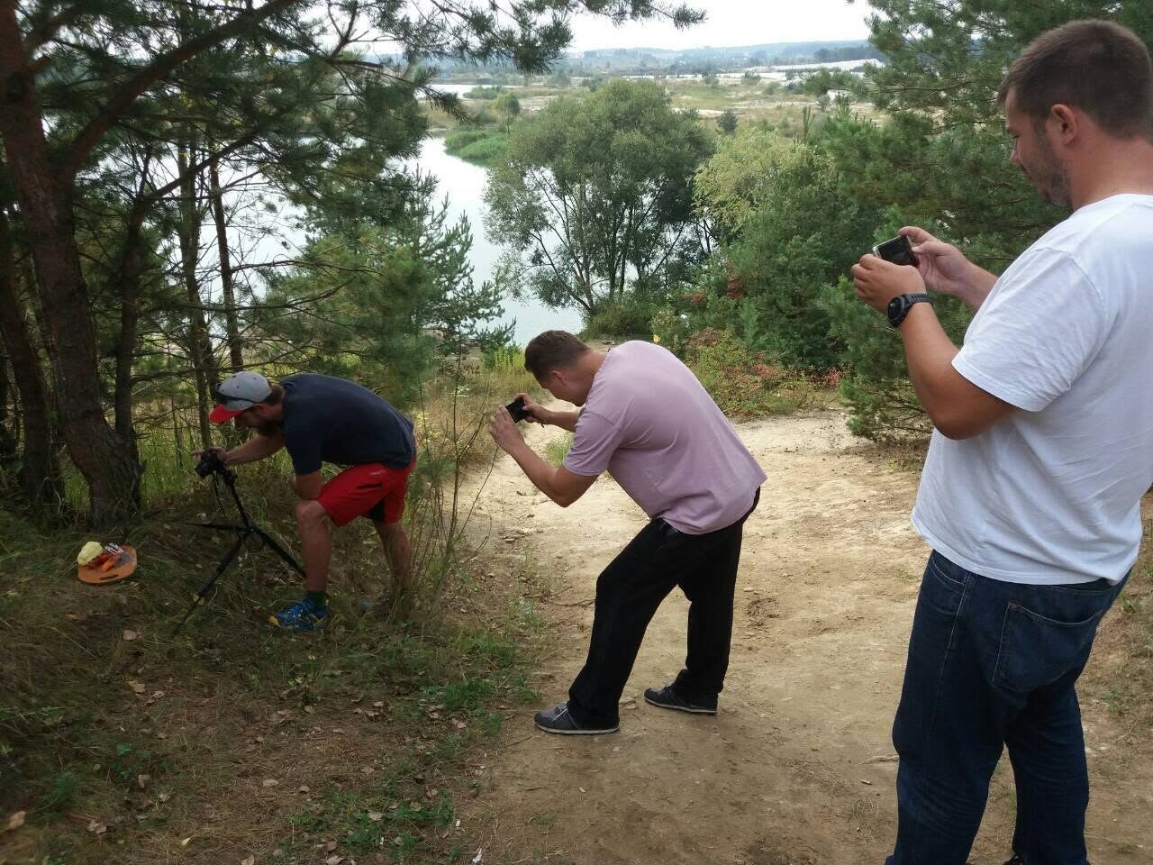 Three photographers shooting one product shot