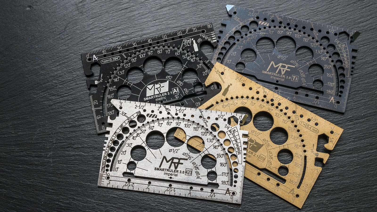 The SmartRuler line in titanium, steel and brass