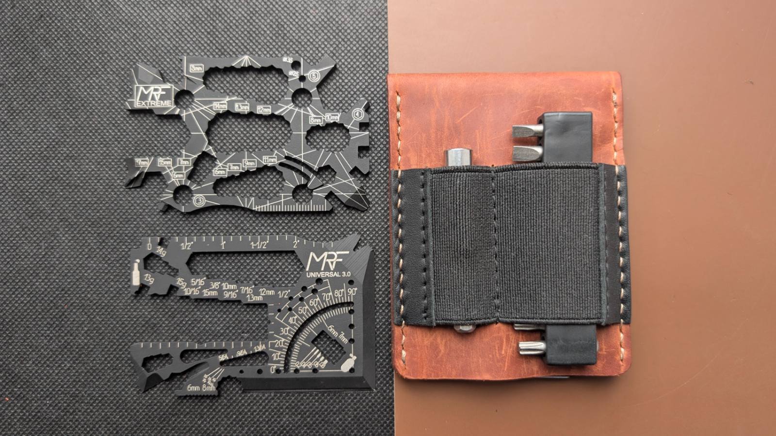 Extreme and Universal 3.0 cards on a black mat beside a brown leather holder loaded with bits